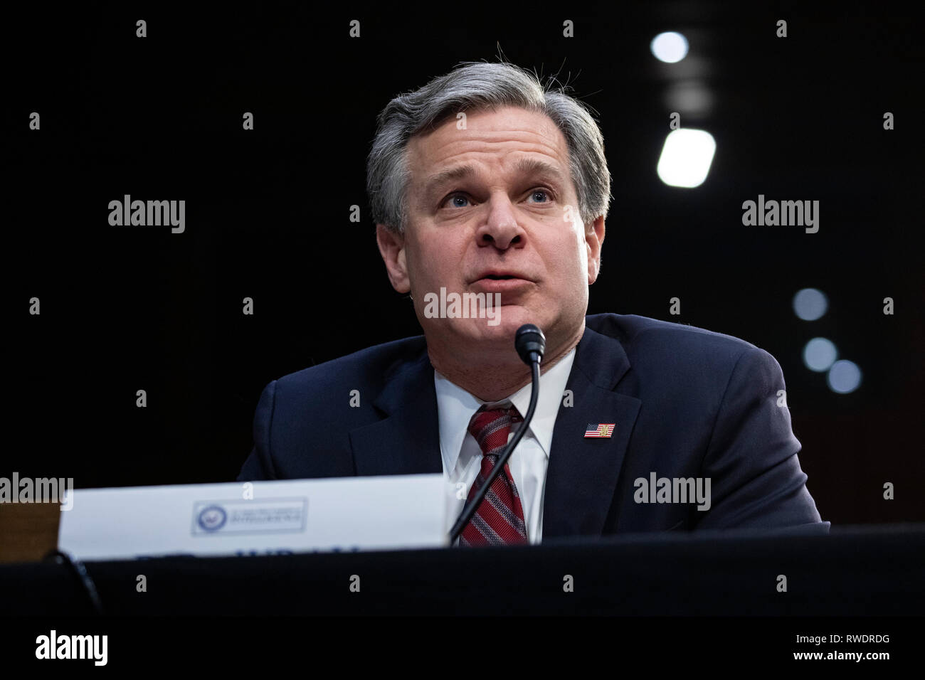 FBI Director Christopher Wray testifies during a Senate Intelligence