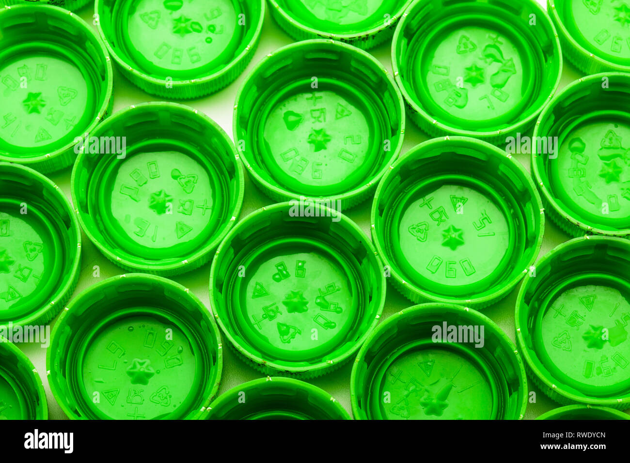 group of green bottle caps, abstract photo Stock Photo Alamy