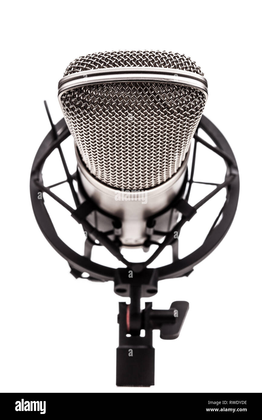 professional studio microphone on a vibrations stand, against white ...