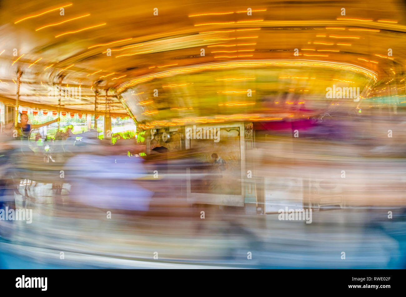 LOS ANGELES, CA, USA, OCTOBER 2, 2016: Visitors ride the Griffith Park Merry-Go-Round in Los Angeles. The ride was brought to the park in 1937. Stock Photo