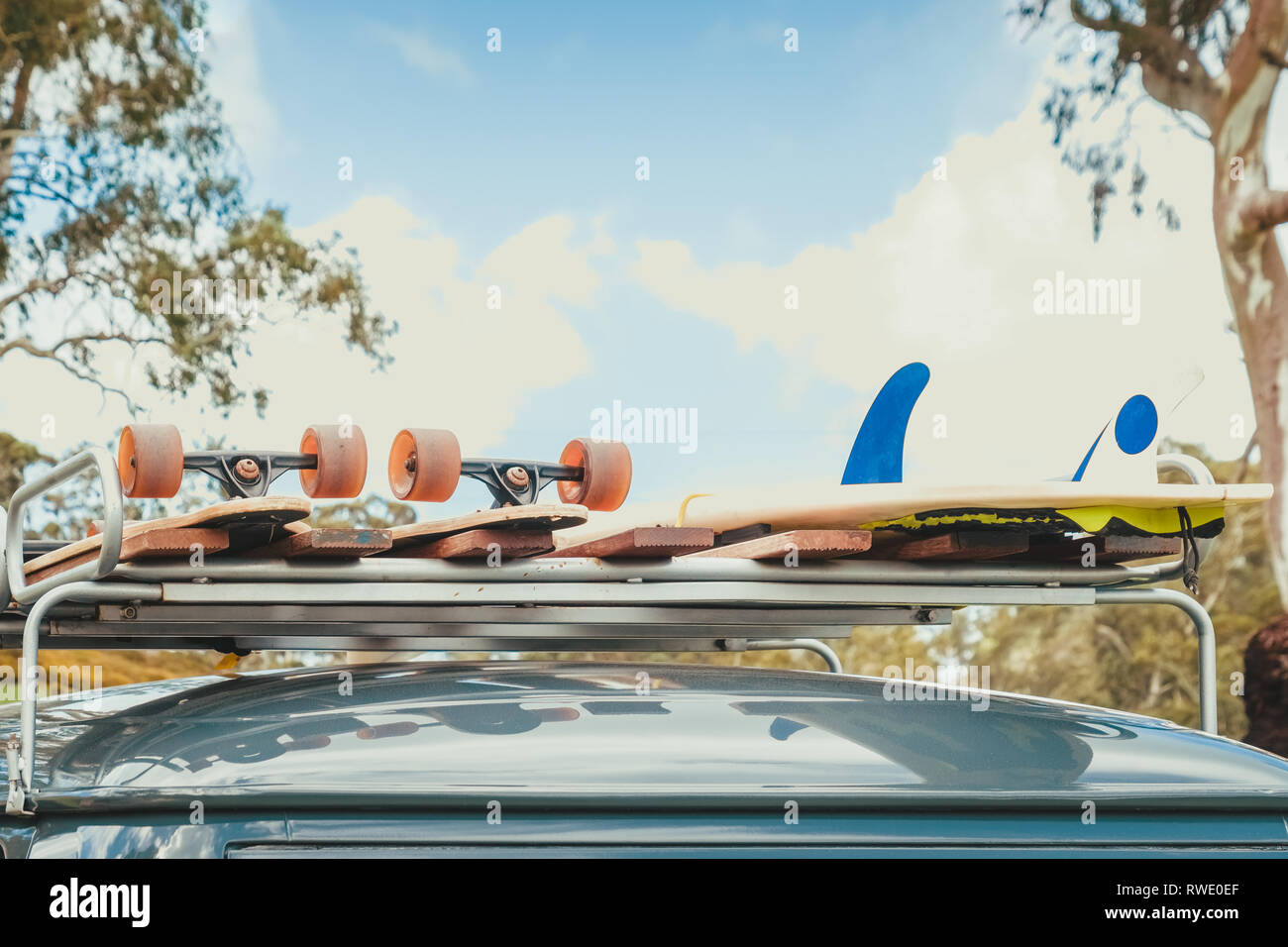 Surfboard on top 2024 of roof box