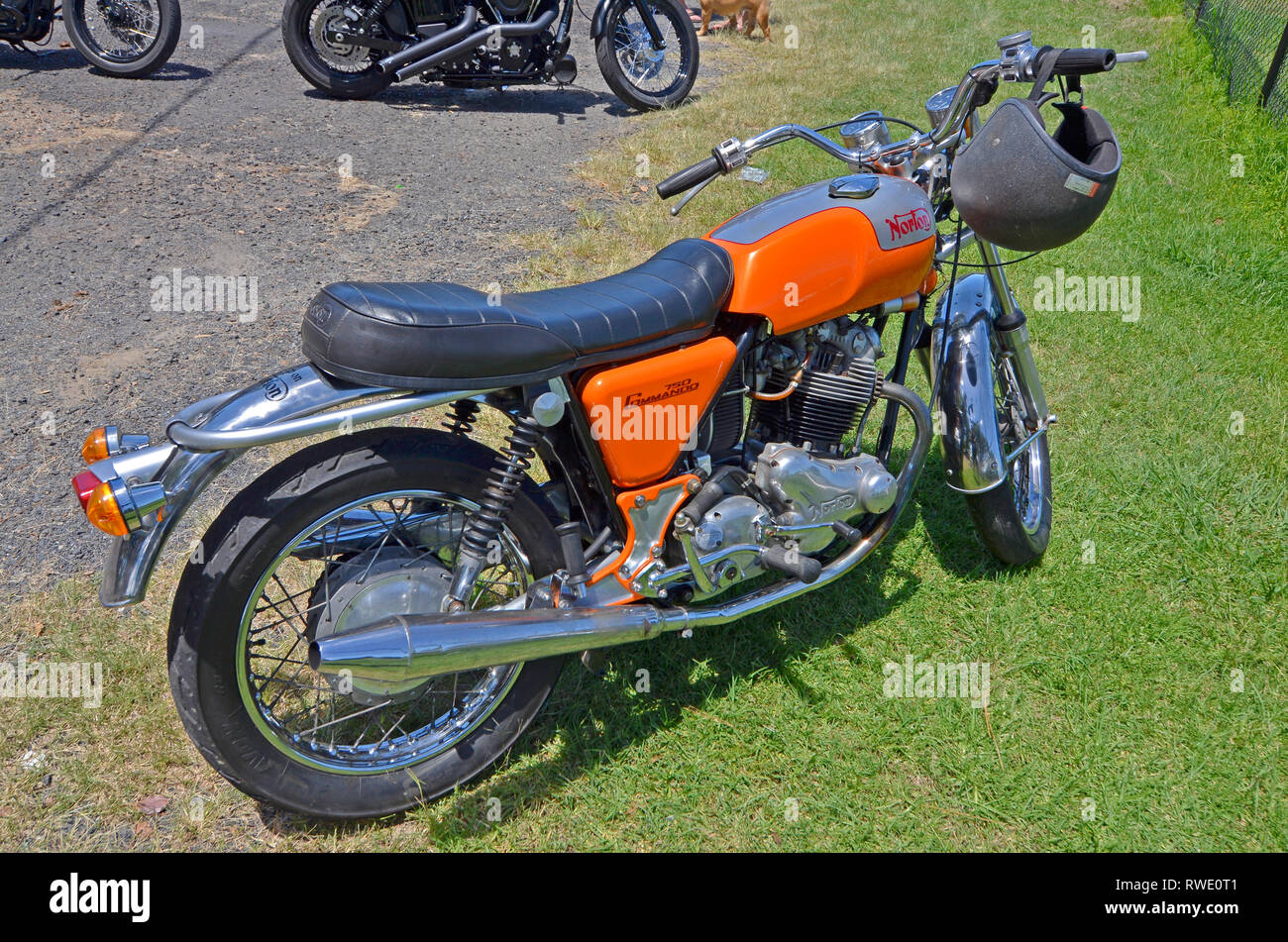 white and orange norton commando 750 classic motorbike Stock Photo - Alamy