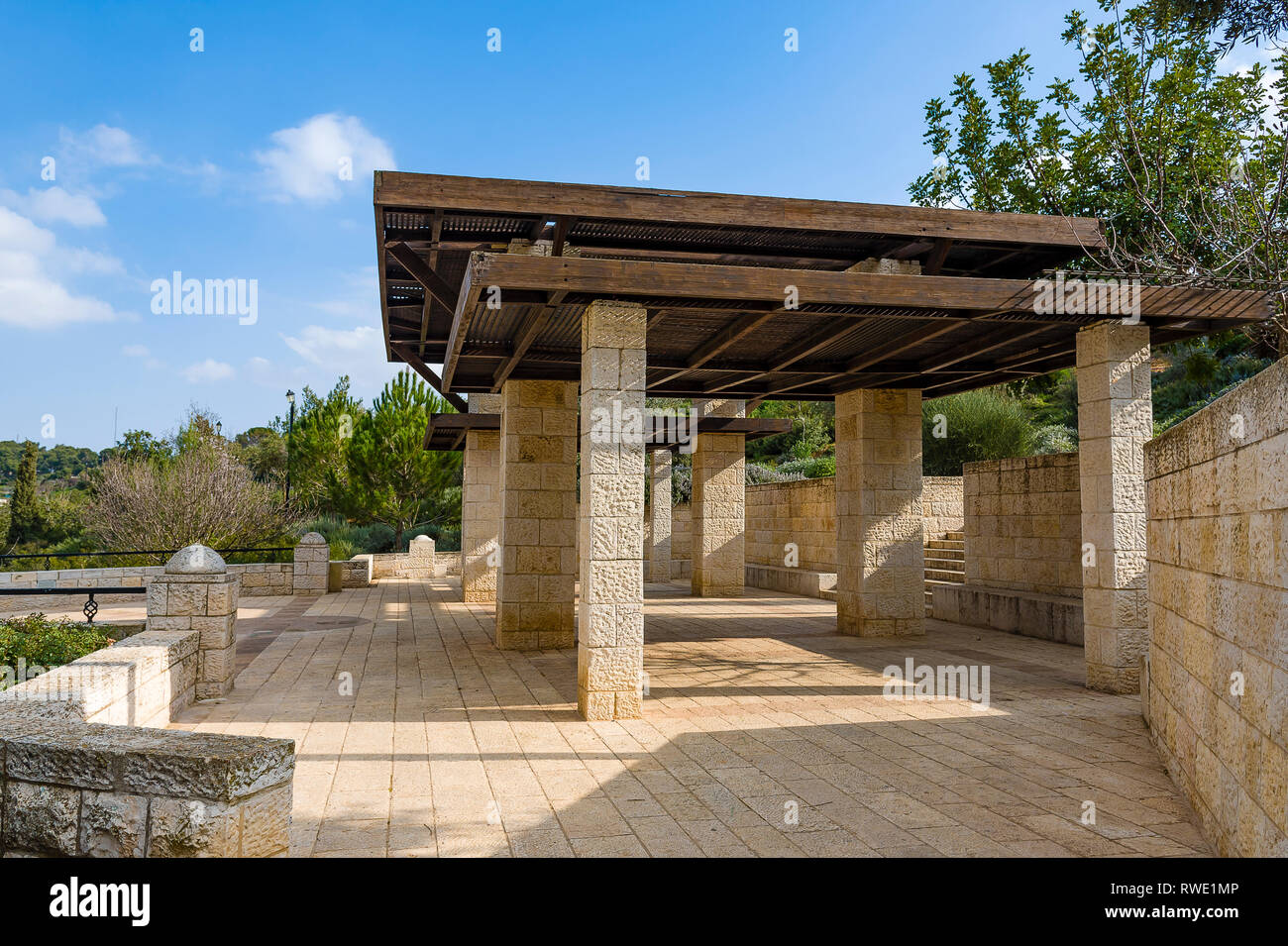 Stone, a large arbor in the background of mountains on a sunny, summer day Jerusalim Stock Photo