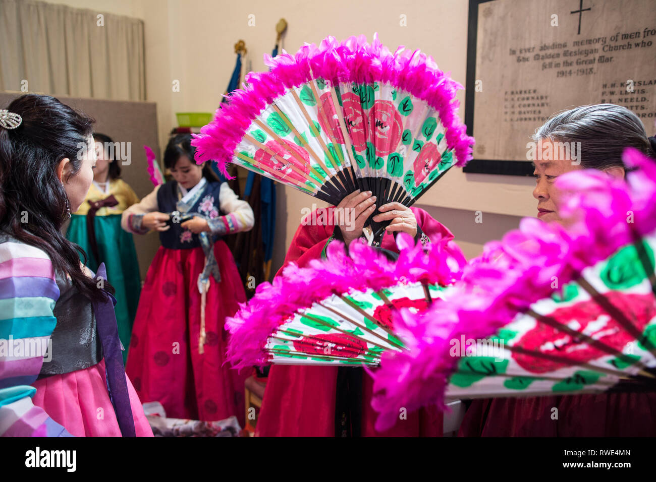 North and South Korean Ladies perform the Buchaechum also called a Fan Dance on the day Korea Commemorates 100th Anniversary of March 1st Independence. Stock Photo