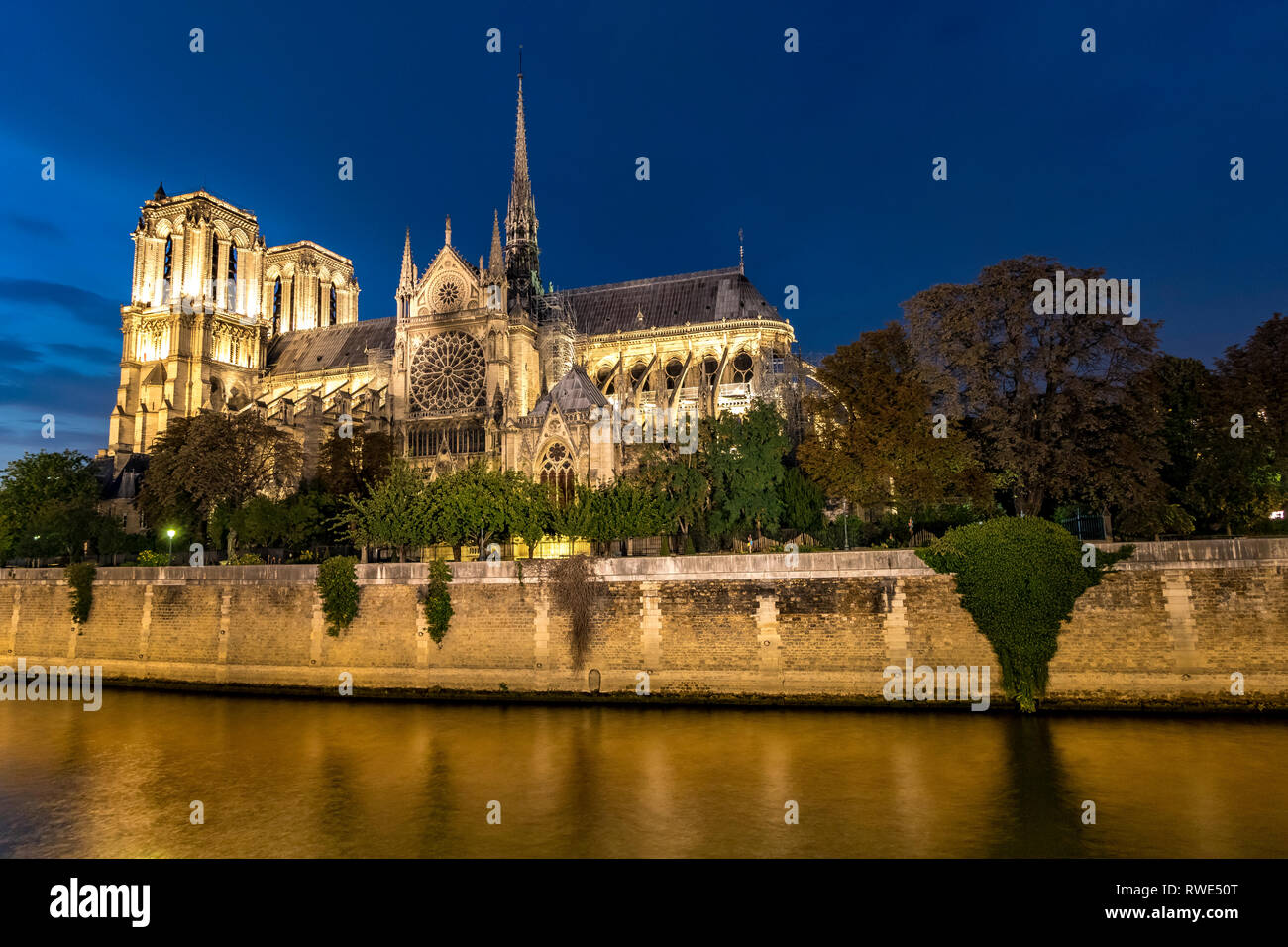 Notre-Dame de Paris at Night Stock Photo