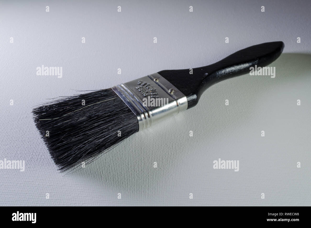 A Studio Photograph of aBlack Handled Paint Brush Stock Photo