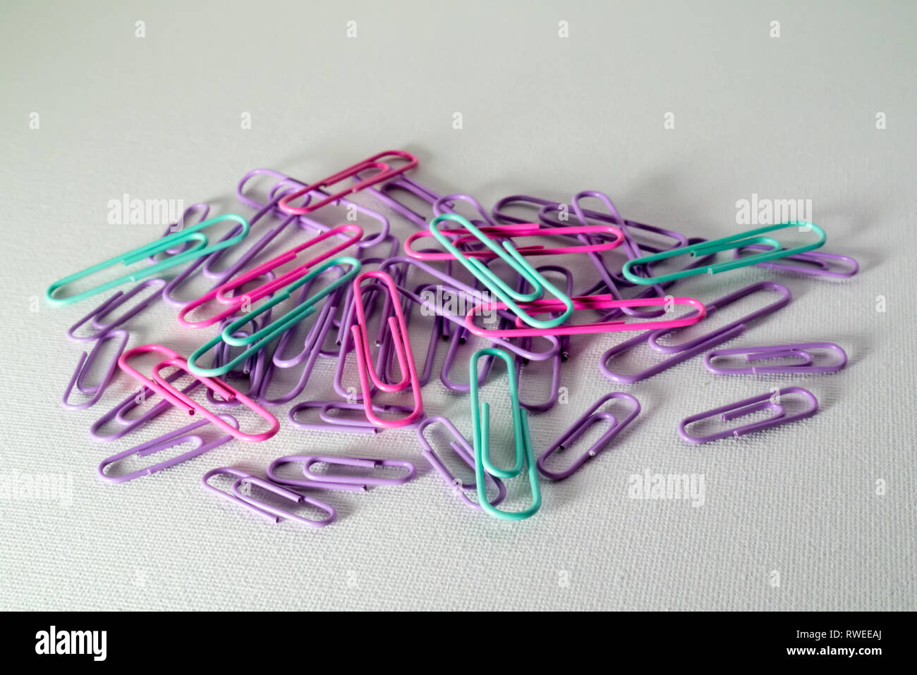 A Studio Photograph of Multicoloured Paperclips Stock Photo