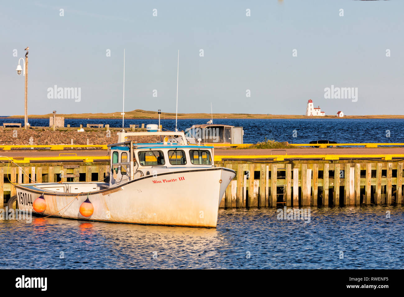 Fishing boats tied up at wharf, Northport, Prince Edward Island, Canada Stock Photo