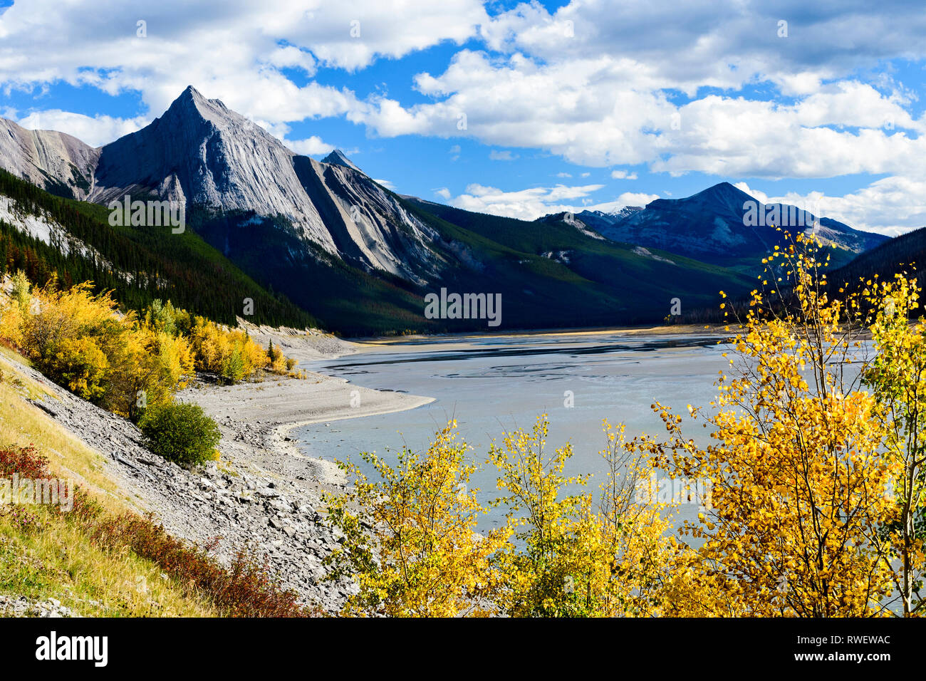 The Maligne mountain range and Medicine Lake in Jasper National Park near Jasper, Alberta. Stock Photo