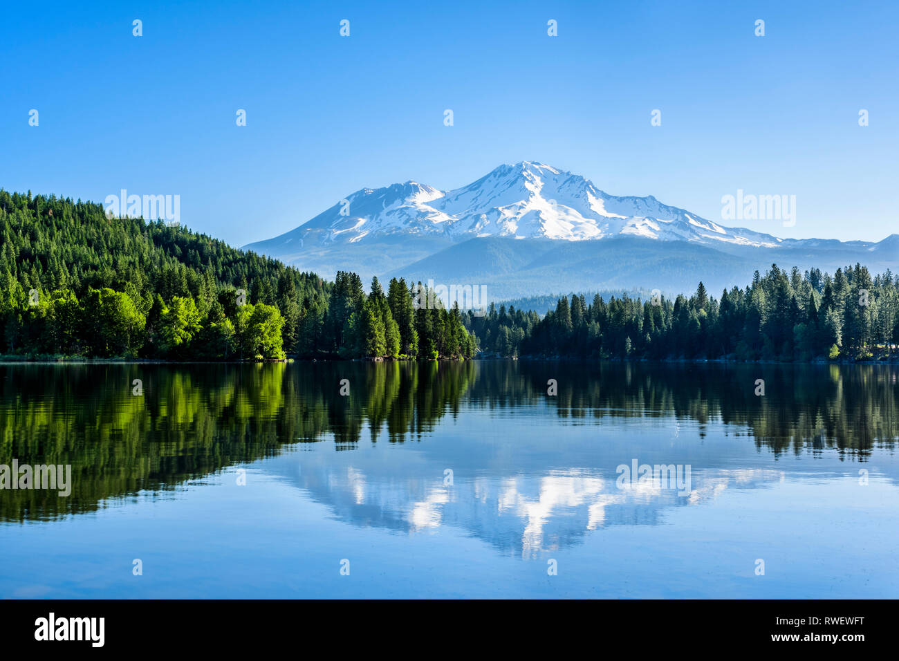 Mt. Shasta and its reflection in Siskiyou Lake near Mt. Shasta ...