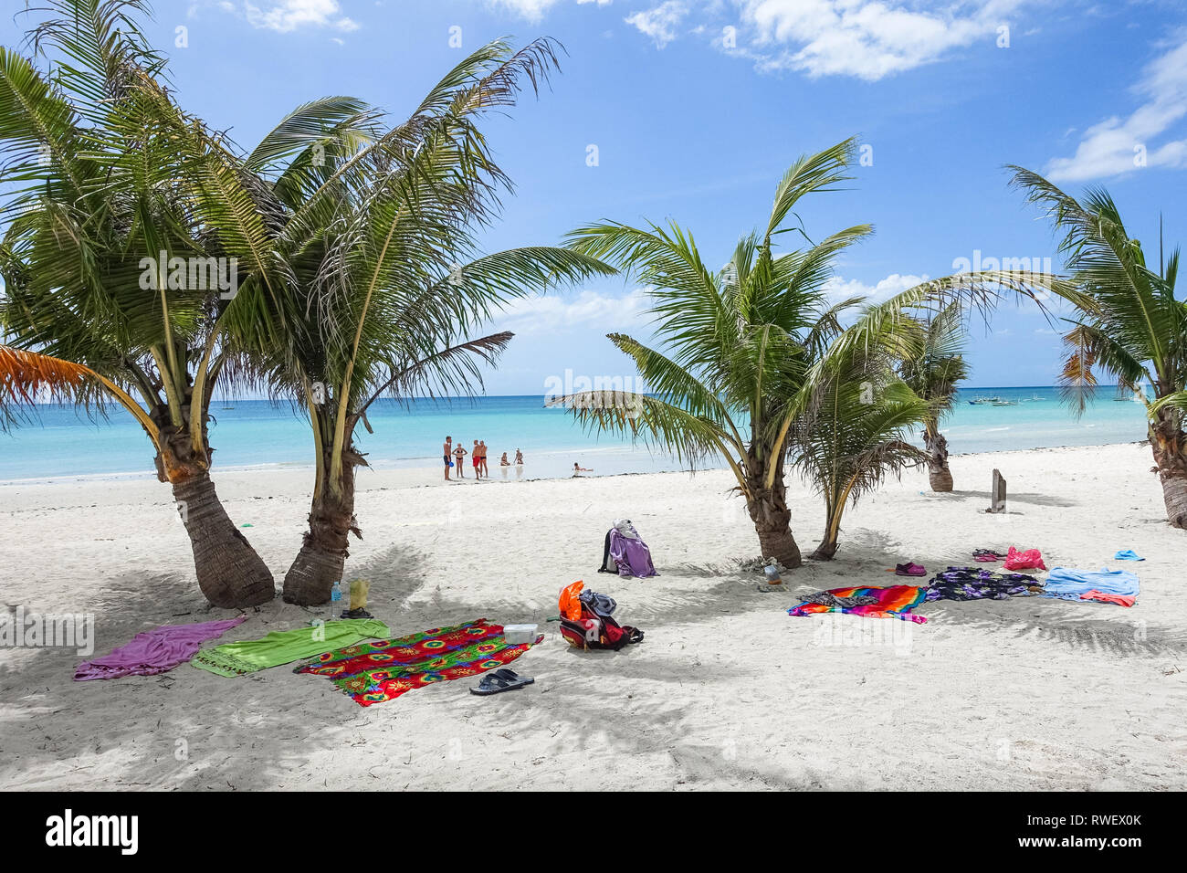Sugar Beach Palms, Tourists and Blankets - Cebu, Philippines Stock Photo