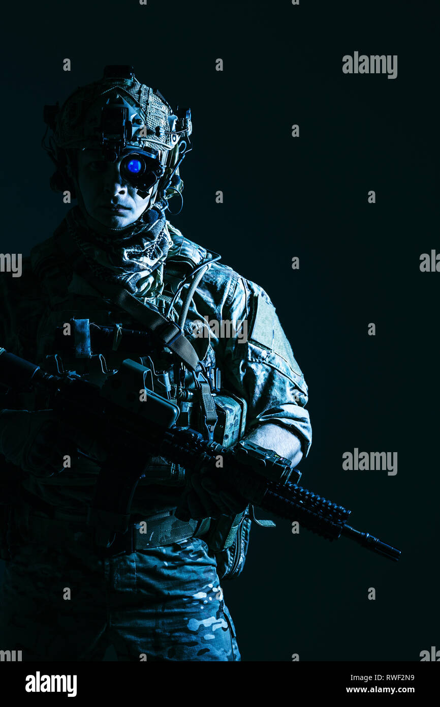 Elite member of U.S. Army rangers in combat helmet and night vision ...