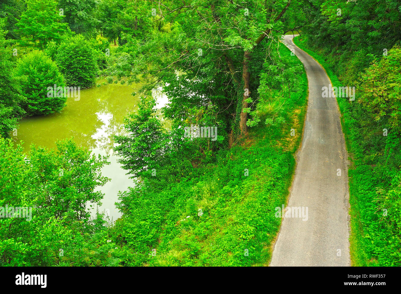 River Dropt and Serres et Montguyard Road at Eymet, Dordogne Department, Aquitaine, France Stock Photo