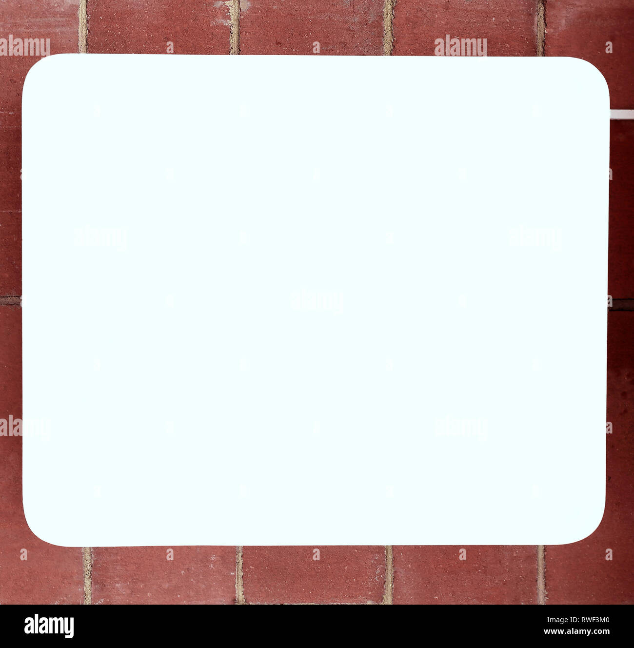 close up. blank banner on brick wall Stock Photo