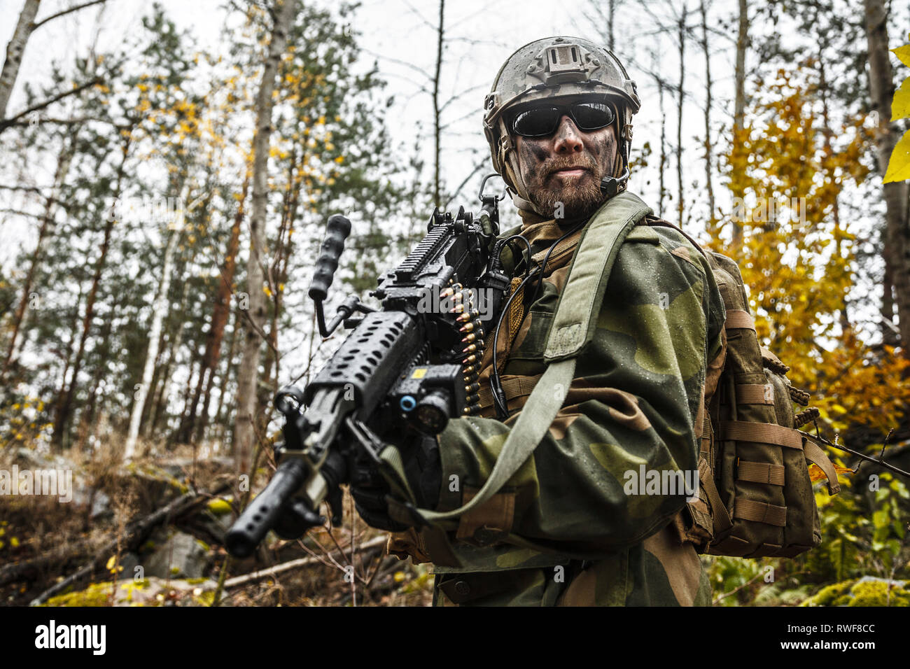 Norwegian Rapid reaction special forces FSK soldier patrolling in the