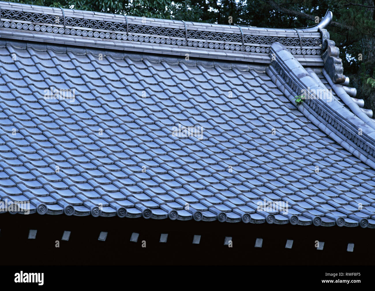 old traditional blue tile roofing of japan architecture background