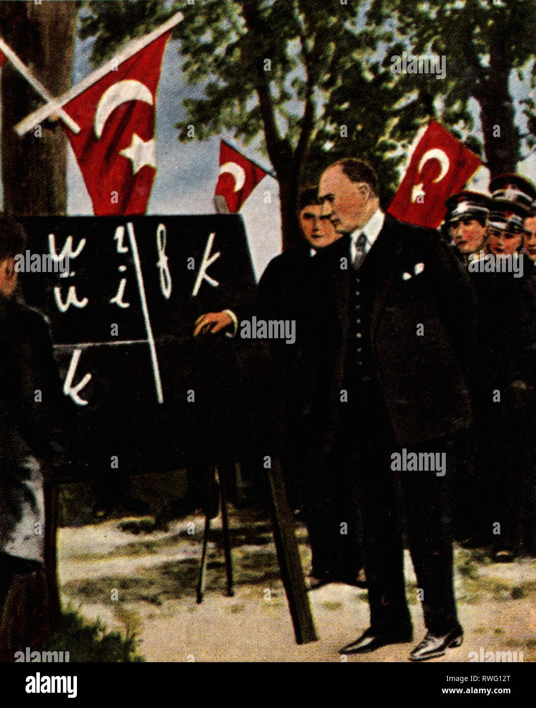 Kemal Pasha, Mustafa called Atatuerk, 12.3.1881 - 10.11.1938, Turkish politician, president of the state 29.10.1923 - 10.11.1928, full length, is explaining the Latin alphabet, 1929, coloured photograph, cigarette card, series 'Die Nachkriegszeit', 1935, Additional-Rights-Clearance-Info-Not-Available Stock Photo
