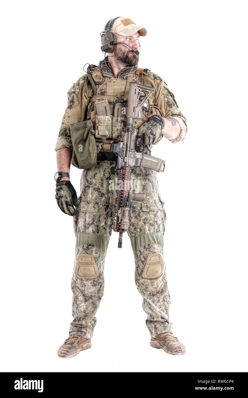 Full length portrait of special forces soldier in field uniform with weapon. Stock Photo