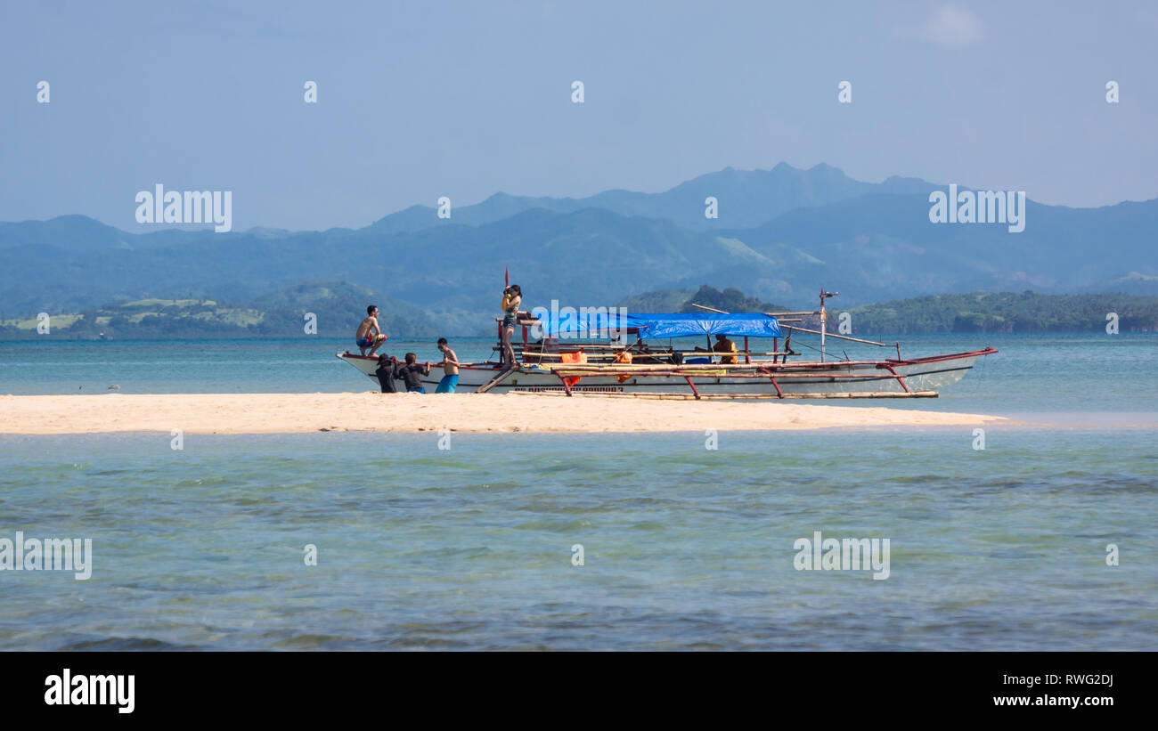 Manlawi Sandbar Tourists on Boat - Caramoan, Philippines Stock Photo