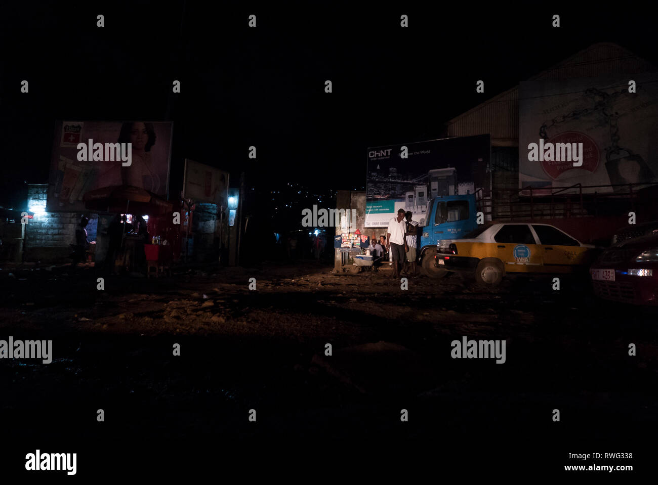 A noir look of nighttime in Freetown, Sierra Leone. Stock Photo