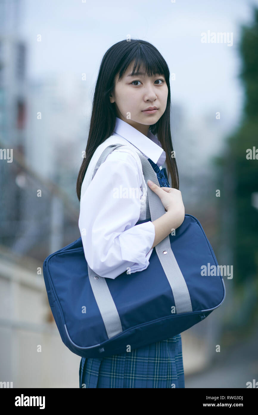 Japanese high school student in uniform downtown Tokyo Stock Photo Alamy