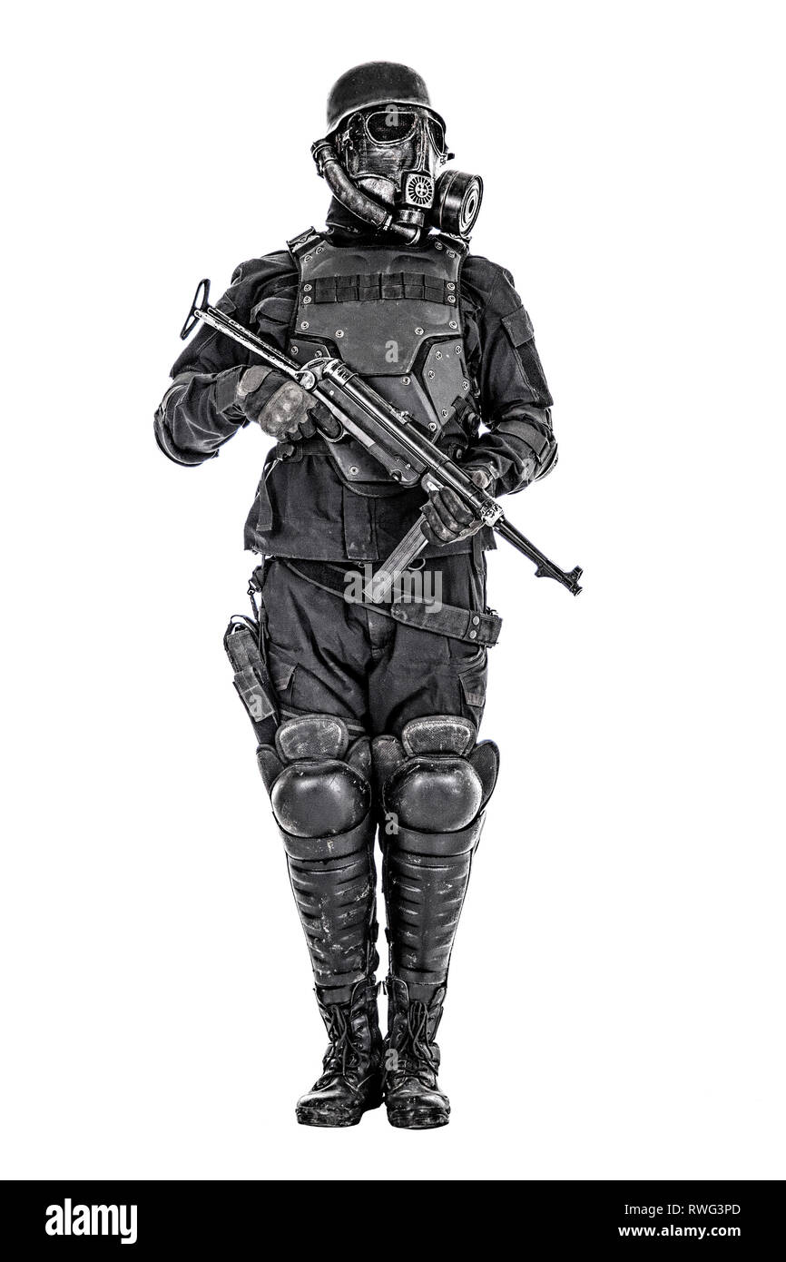 Futuristic Nazi soldier wearing gas mask and steel helmet with Schmeisser submachine gun. Stock Photo