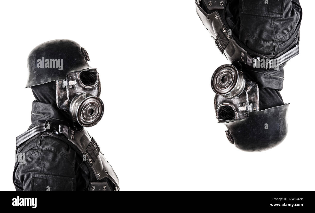 Futuristic Nazi soldiers wearing gas mask and steel helmet. Stock Photo