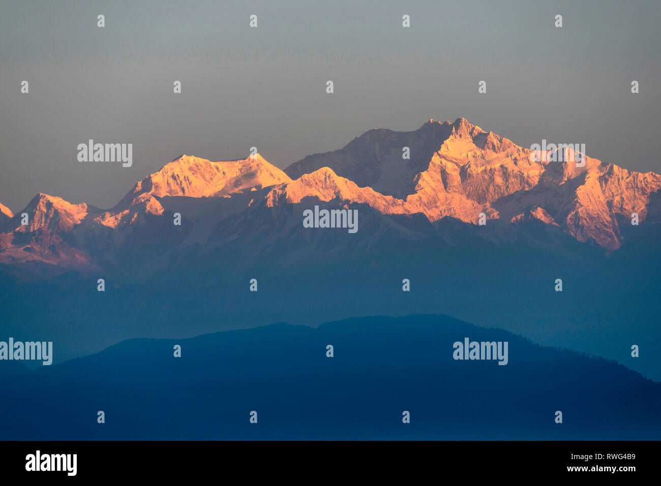 First rays over Kanchenjunga Peak, India. Stock Photo