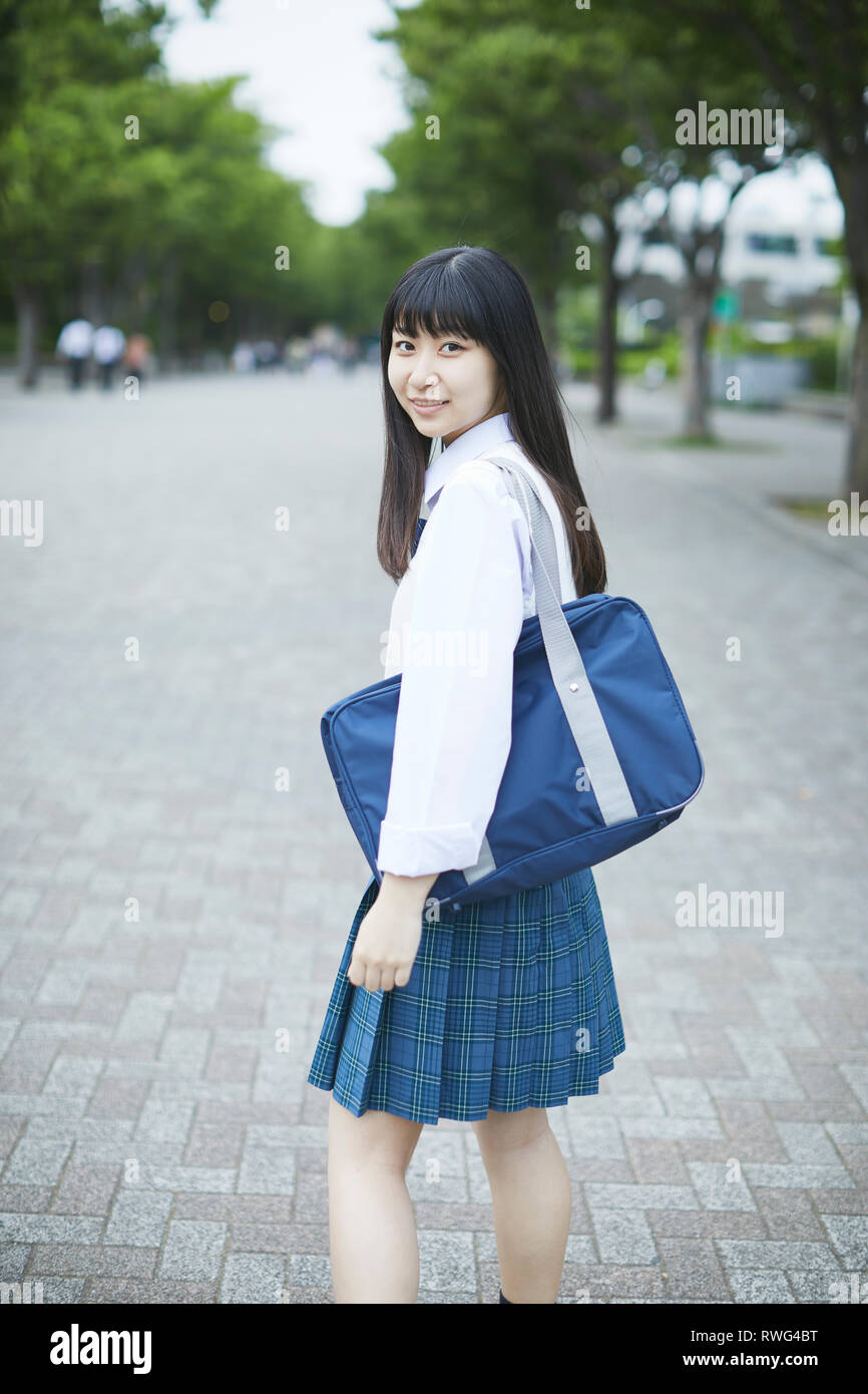 Japanese high school student in uniform downtown Tokyo Stock Photo - Alamy