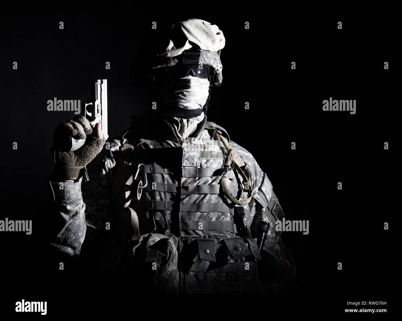 Special forces soldier with service pistol in hand Stock Photo - Alamy