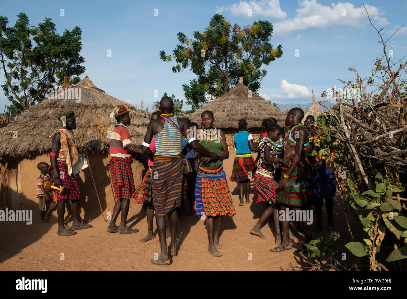 Traditional Karamojong dancing in a village, northern Uganda Stock Photo