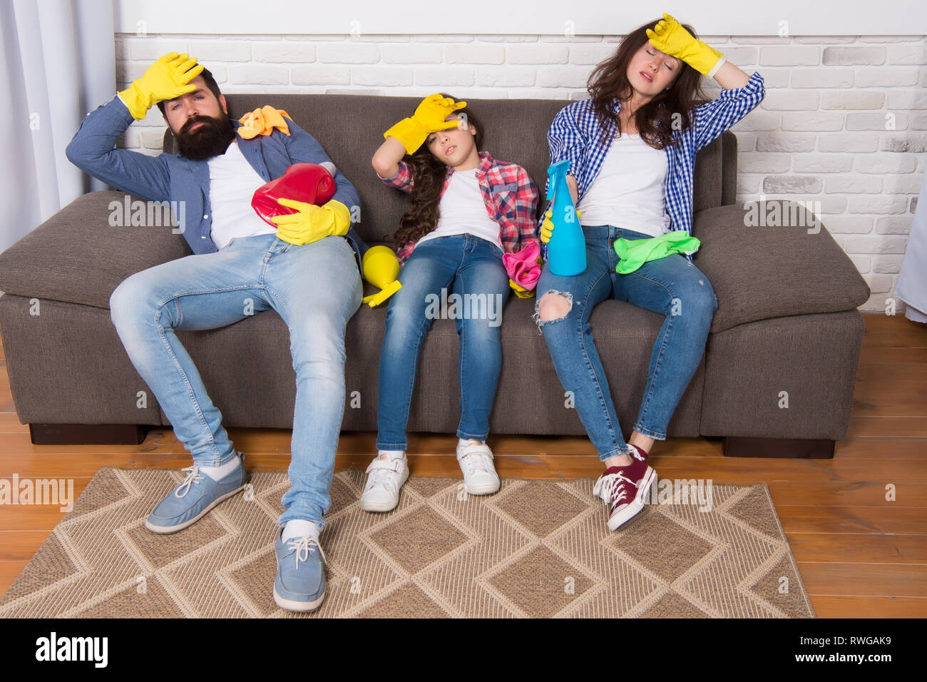 Cleaning all day exhausting occupation. Tired parents and kid