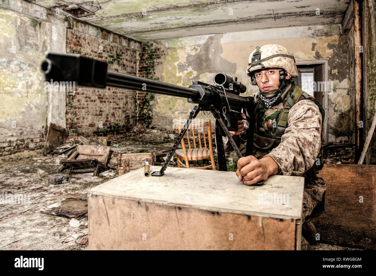 Military Sniper Armed With A 50 Caliber Sniper Rifle On Bipod Stock Photo Alamy