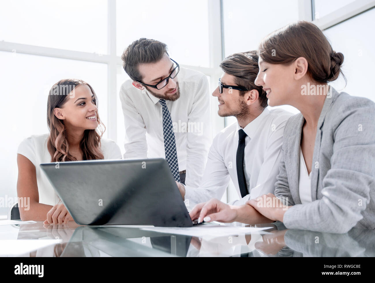 successful business team in the workplace in the office Stock Photo - Alamy