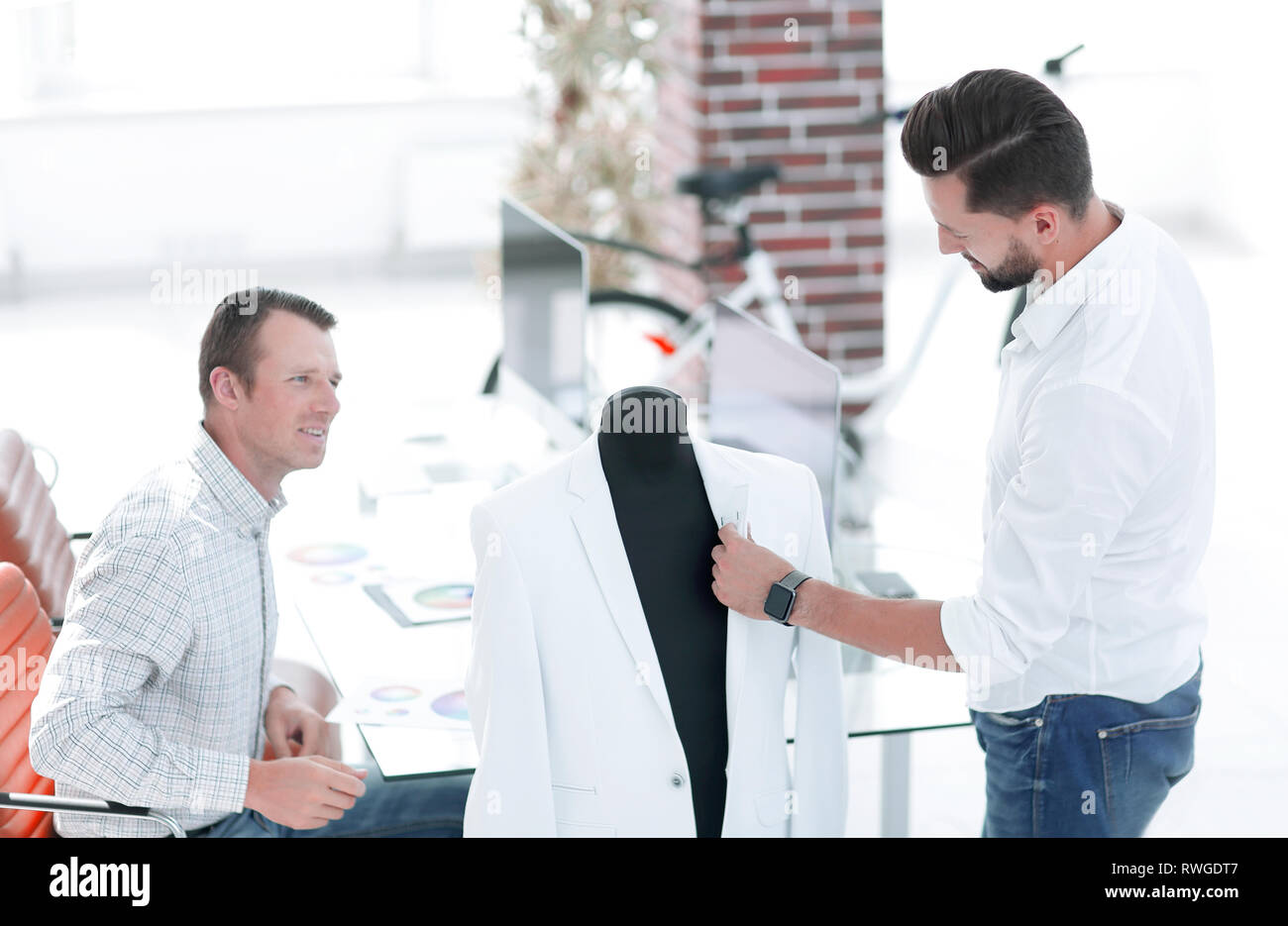 menswear designers working in the Studio. Stock Photo