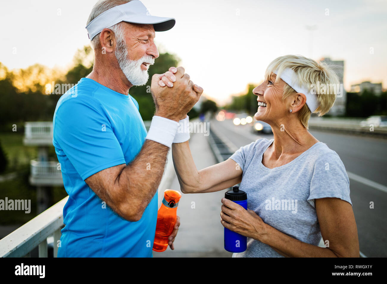 Mature couple is doing sport outdoors. Healthy lifestyle concept Stock Photo