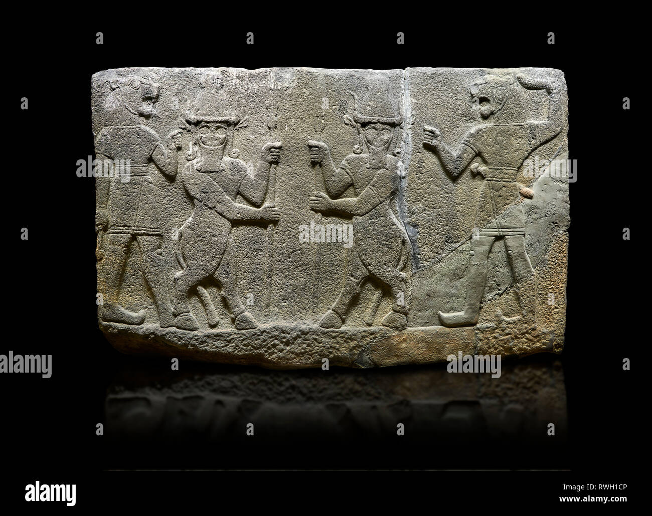 Photo of Hittite relief sculpted orthostat stone panel of Herald's Wall. Basalt, Karkamıs, (Kargamıs), Carchemish (Karkemish), 900-700 B.C. Anatolian  Stock Photo