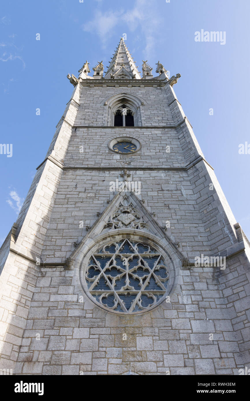 Looking up at the tower and steeple of Saint Margarets church Bodelwyddan North Wales. Built in 1860 also known as the marble church Stock Photo