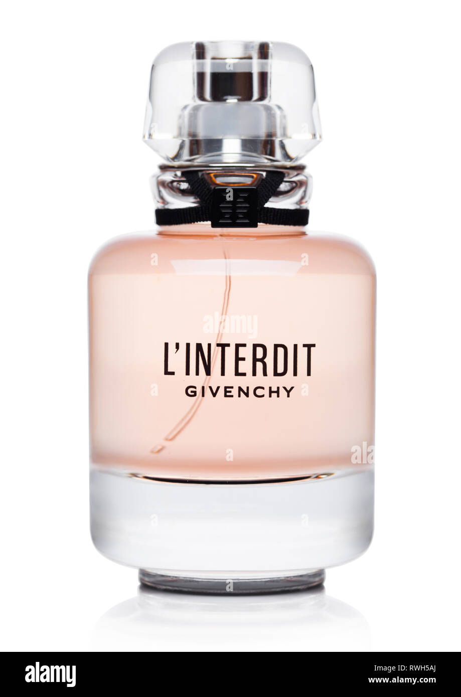 LONDON, UK - MARCH 05, 2019: Bottle of Givenchy L'interdit perfume on white. Stock Photo
