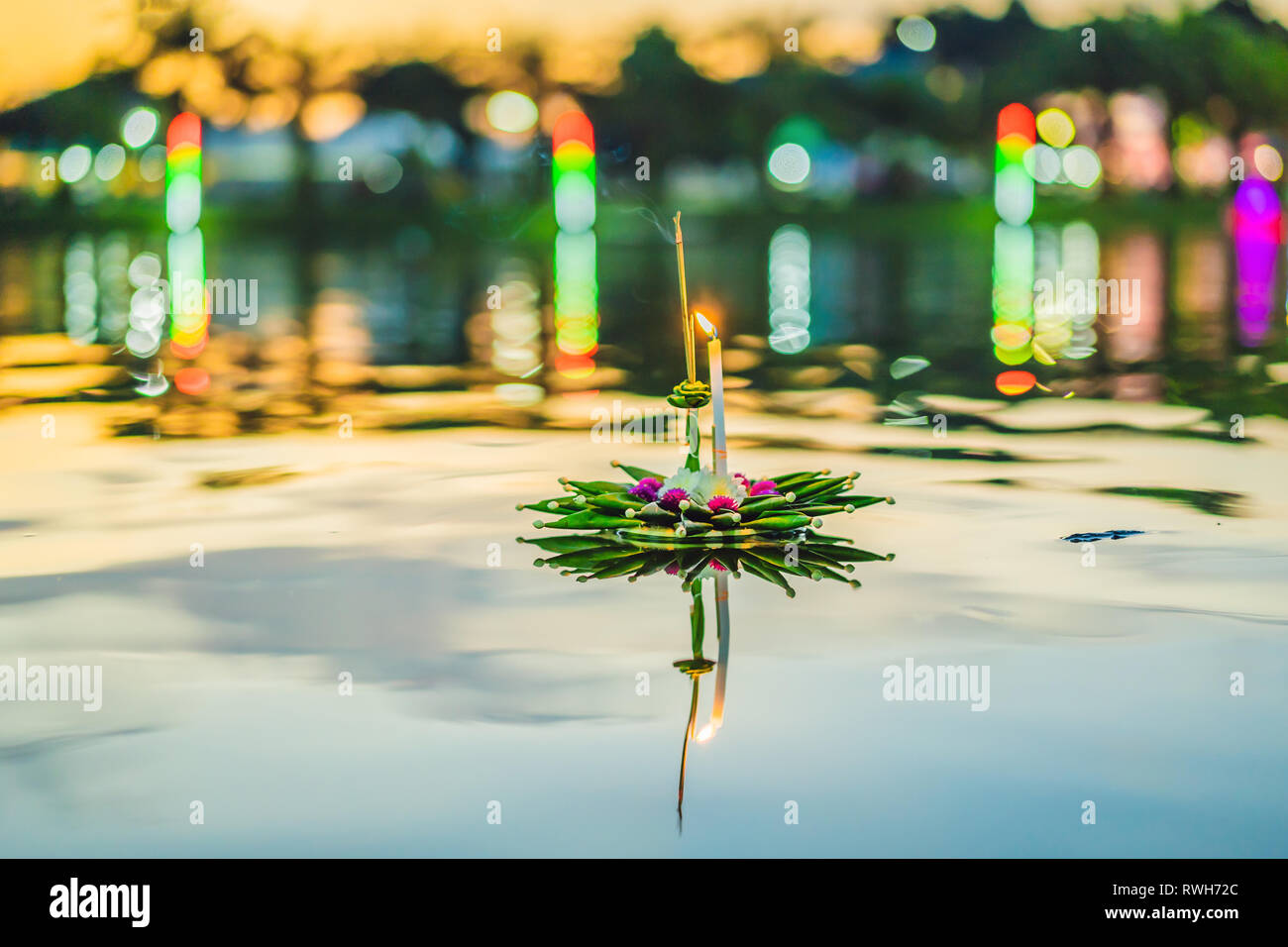 Loy Krathong festival, People buy flowers and candle to light and float on water to celebrate the Loy Krathong festival in Thailand Stock Photo
