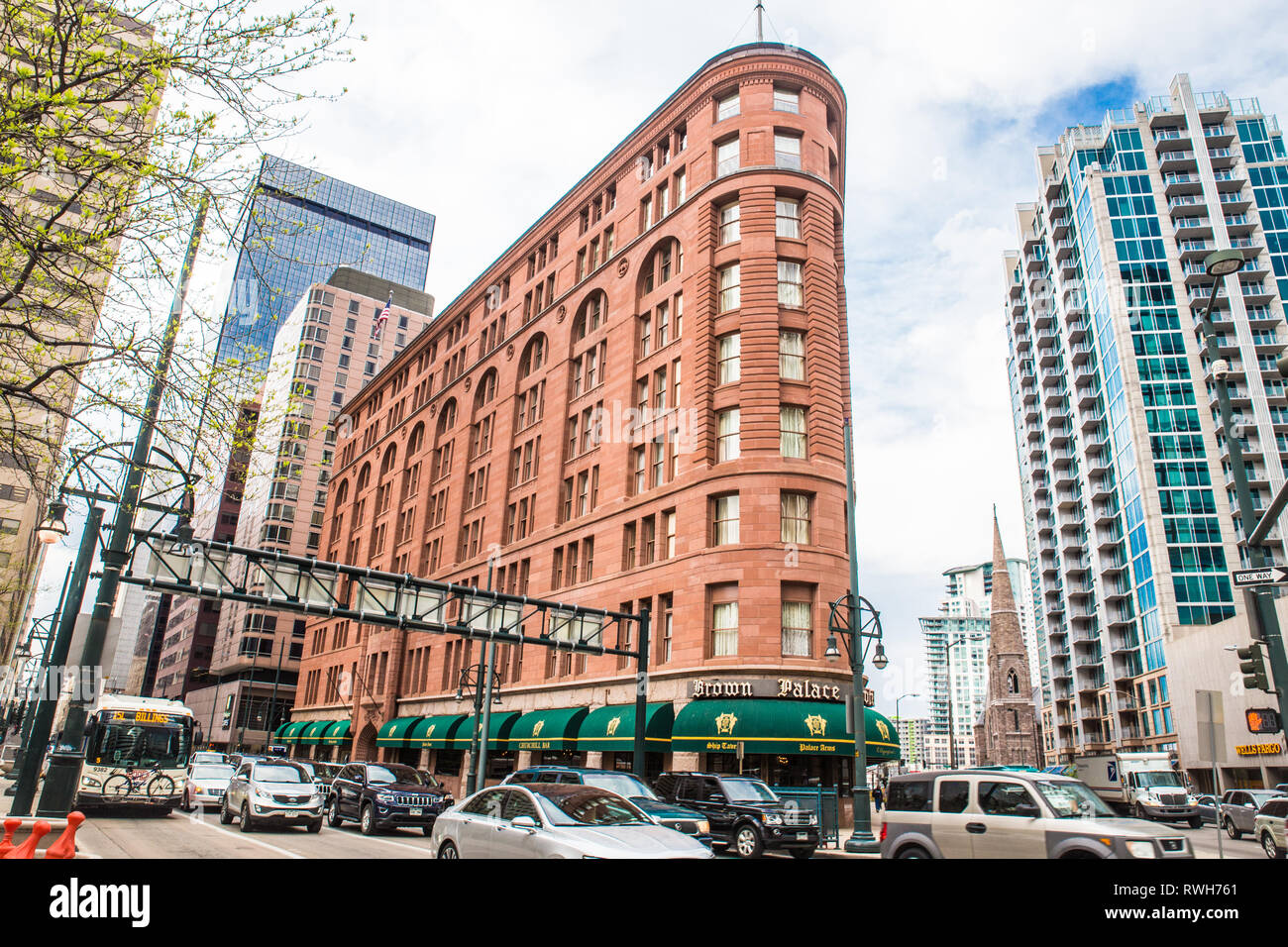 DENVER, COLORADO - APRIL 30. 2018: Street scene from the city of Denver Colorado with historic Brown Palace hotel and spa in view Stock Photo