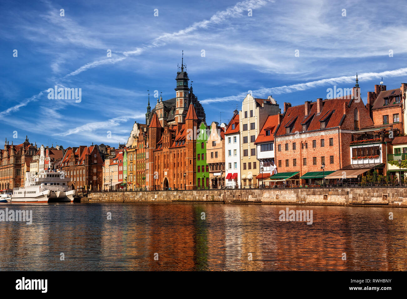 View of the riverside on Old Town by the Motlawa river in early morning light. Gdansk, Poland. Stock Photo