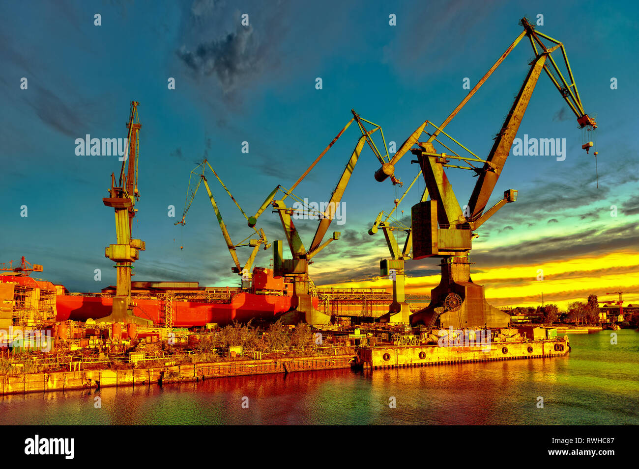 Big cranes in shipyard Gdansk, Poland. Stock Photo
