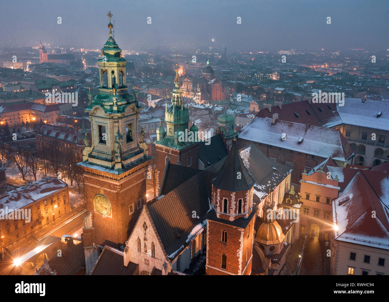 Aerial view of the historical center of Krakow, church, Wawel Royal Castle at night. Old town in winter Stock Photo