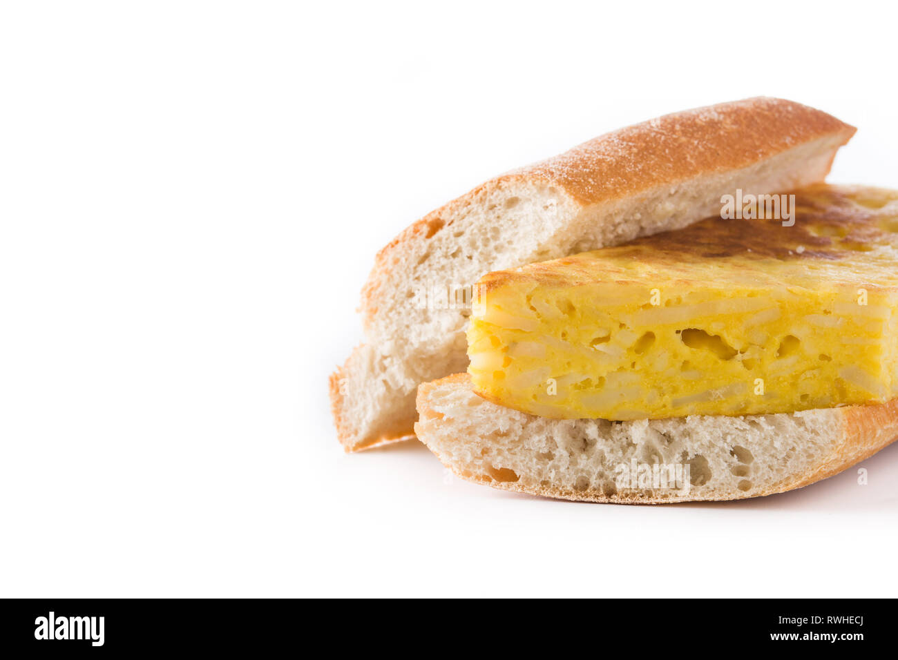 Bocadillo de tortilla española. Spanish potato omelette sandwich isolated on white background. Copyspace Stock Photo