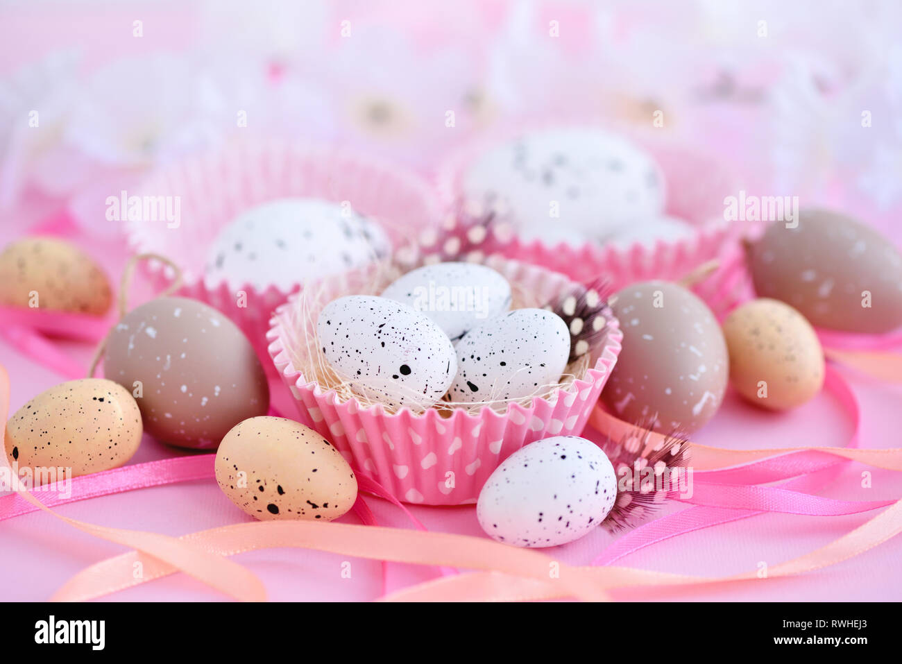 Festive easter background with eggs and ribbons Stock Photo