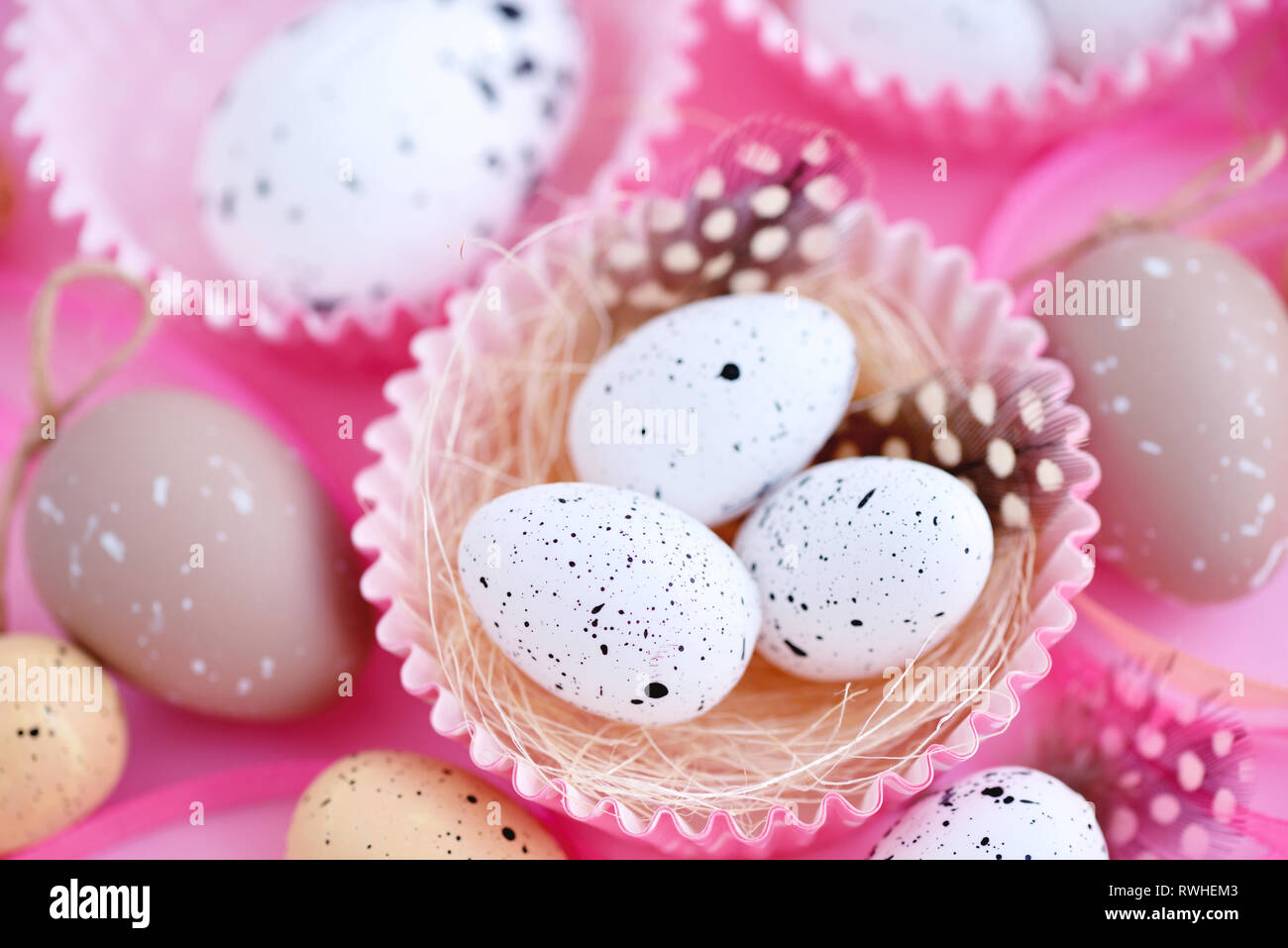 Festive easter background with eggs and ribbons Stock Photo