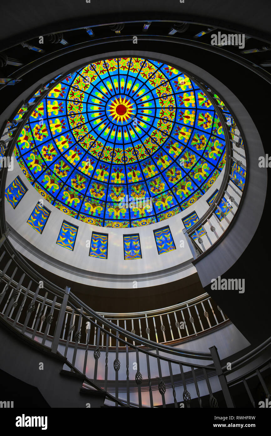 Colorful glass ceiling window inside big cathedral church Stock Photo