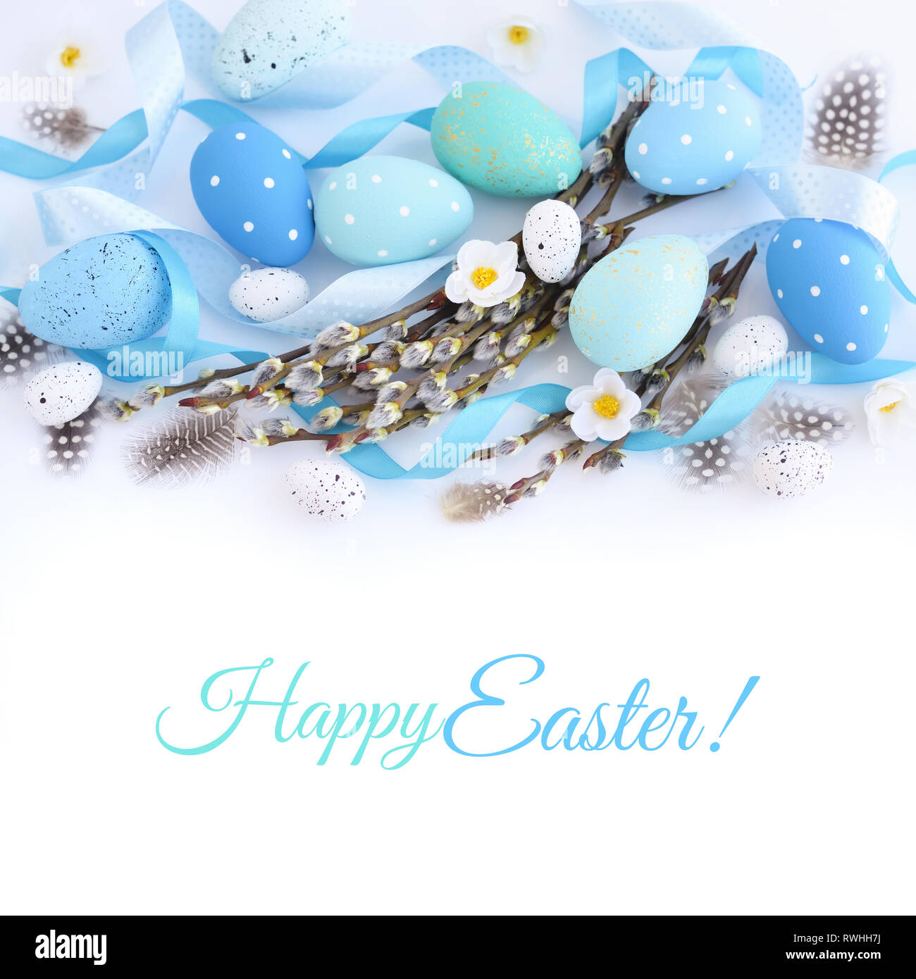 Easter eggs and willow branches on white background. Easter card with ...