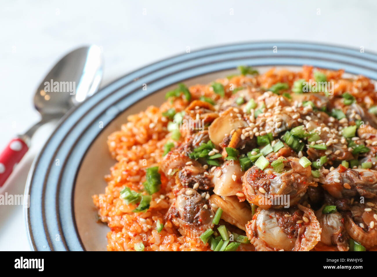 Cockle bibimbap, Korean traditional winter season food Stock Photo Alamy